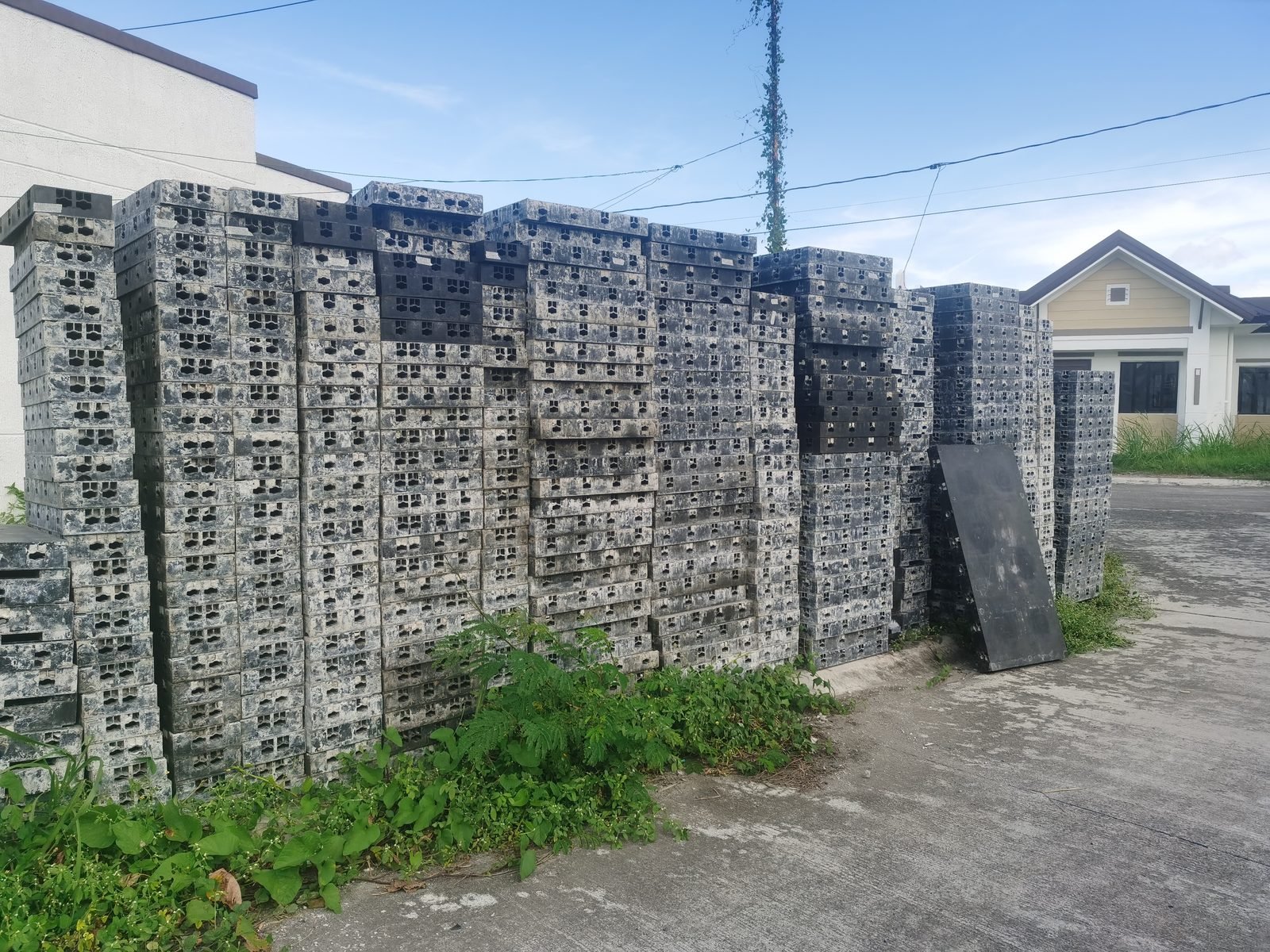 WINLONG stacked ABS plastic formwork panels at warehouse yard